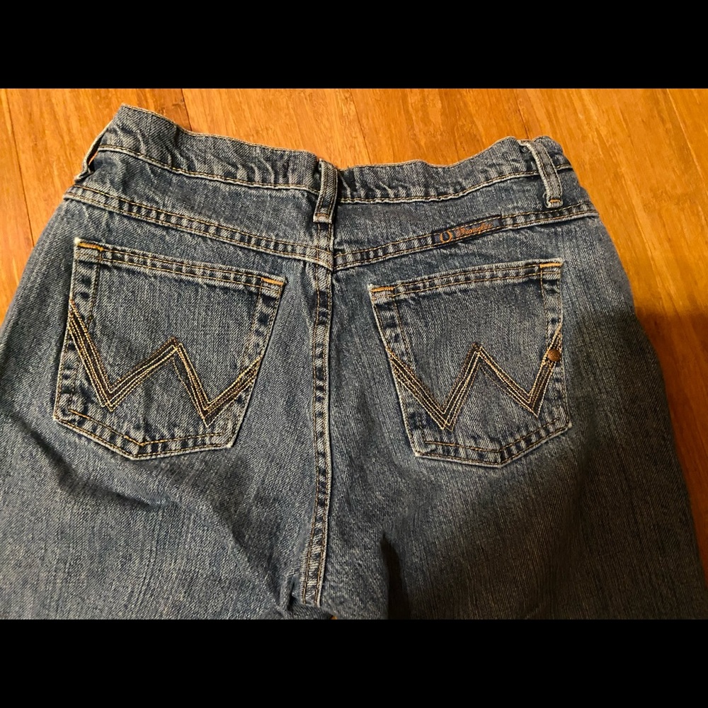 Cowgirl cut wranglers